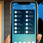 Modern Smart Home Security System Interface**

"A sleek, modern smartphone interface displaying a smart home security app dashboard. The app shows live feeds from multiple security cameras (front door, backyard), sensor status (doors/windows secured), and a lock icon indicating the front door is locked.  The background is a blurred image of a comfortable Bengali family home at dusk. The app interface uses Bangla script labels alongside English icons. The overall aesthetic is clean, professional, and user-friendly. Fully clothed, appropriate content, safe for work, professional, perfect anatomy, natural proportions, high quality."

**